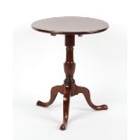 Property of a lady - a mahogany circular topped tripod occasional table with turned column, re-