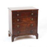 Property from the estate of the late Julian Bream (1933-2020) - a George III mahogany commode