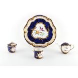 Property of a gentleman - a 19th century Sevres style cabaret set, painted with exotic birds on a