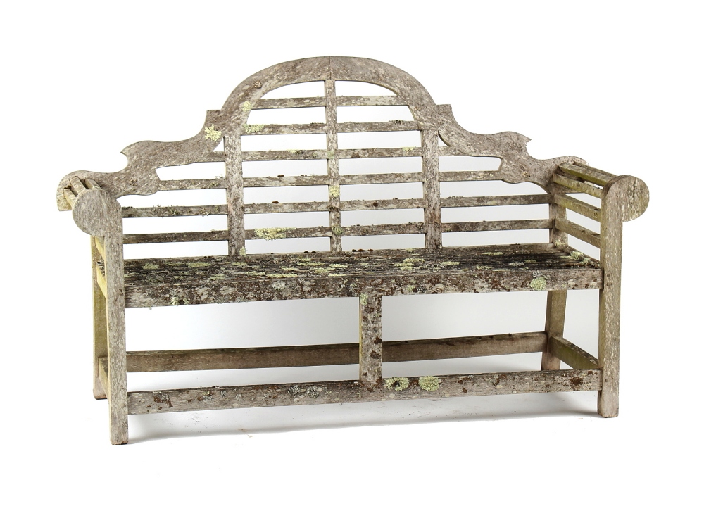 Property from the estate of the late Julian Bream (1933-2020) - a well weathered teak garden bench