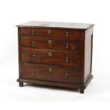 Property of a deceased estate - a late 17th century walnut chest of four long graduated drawers,