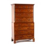 Property of a lady - a George III mahogany two-part tallboy or chest-on-chest, with dentil