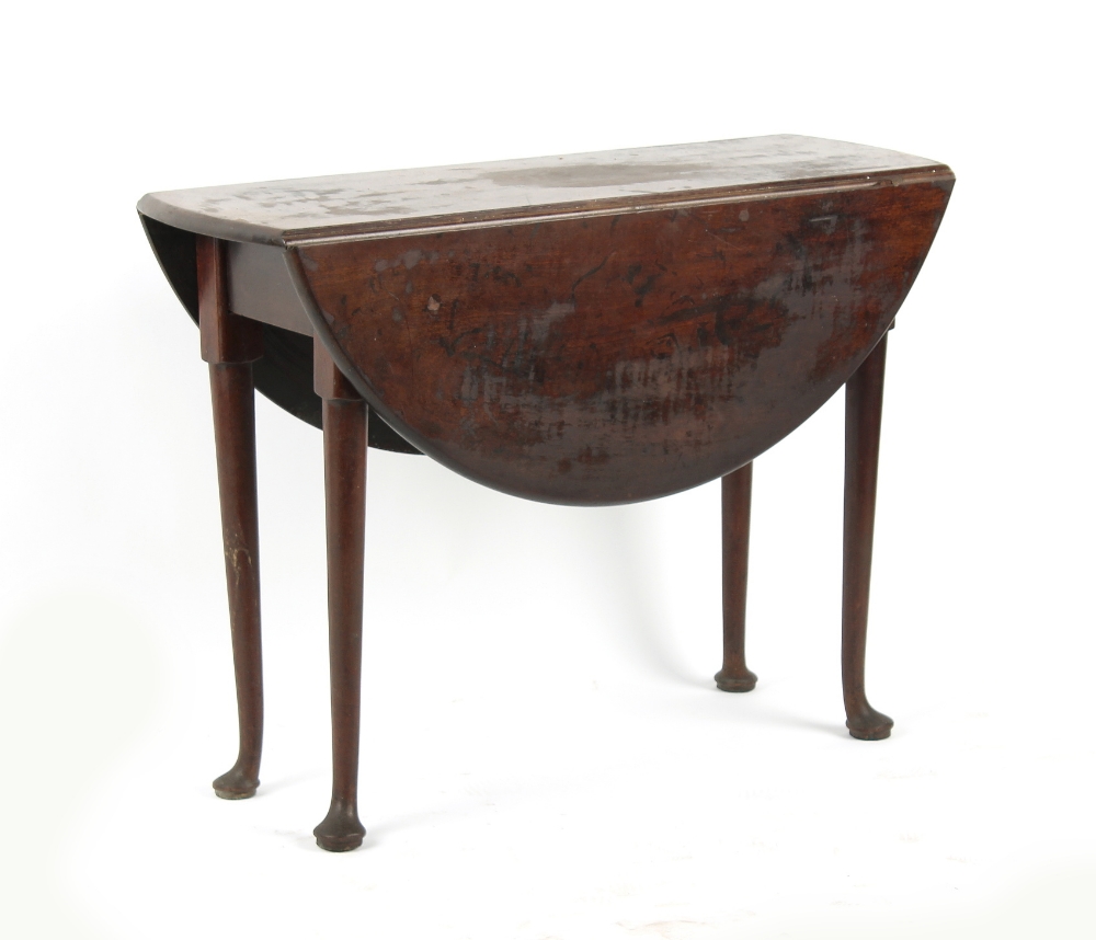 Property of a deceased estate - a mid 18th century George II Cuban mahogany oval drop-leaf table