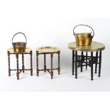 Property of a deceased estate - three brass circular topped tables on folding wooden bases; together