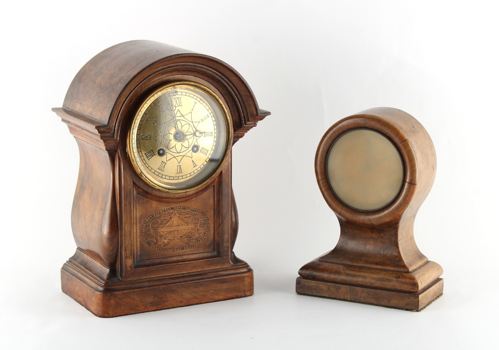 Property of a deceased estate - an early 20th century walnut cased mantel clock with French 8-day
