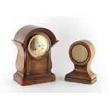 Property of a deceased estate - an early 20th century walnut cased mantel clock with French 8-day