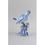 Property of a deceased estate - a late 18th century Dutch Delft blue & white model of a bird perched