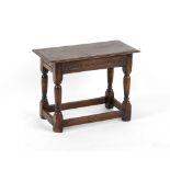 Property of a lady - a reproduction oak joint stool, 24ins. (61cms.) long.