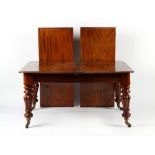 Property of a lady - a Victorian mahogany telescopic wind-out extending dining table with two