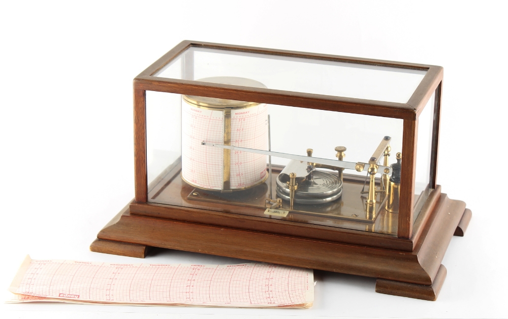 Property of a lady - a barograph, in glazed case, with a quantity of spare graph papers (a lot).