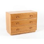 Property of a deceased estate - ensuite with the preceding lot - an Ercol light elm chest of three