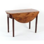 Property of a gentleman - a solid burr yew wood oval topped pembroke table, 40ins. (101.5cms.) long.