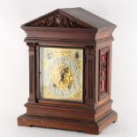 Property of a lady - a late 19th / early 20th century oak cased mantel clock with Winterhalder &
