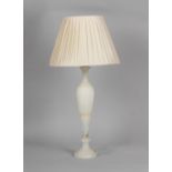 Property of a gentleman - a large white alabaster table lamp, with shade, 30.25ins. (92cms.) high (