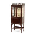 Property of a deceased estate - an Edwardian mahogany china display cabinet with blind fretwork