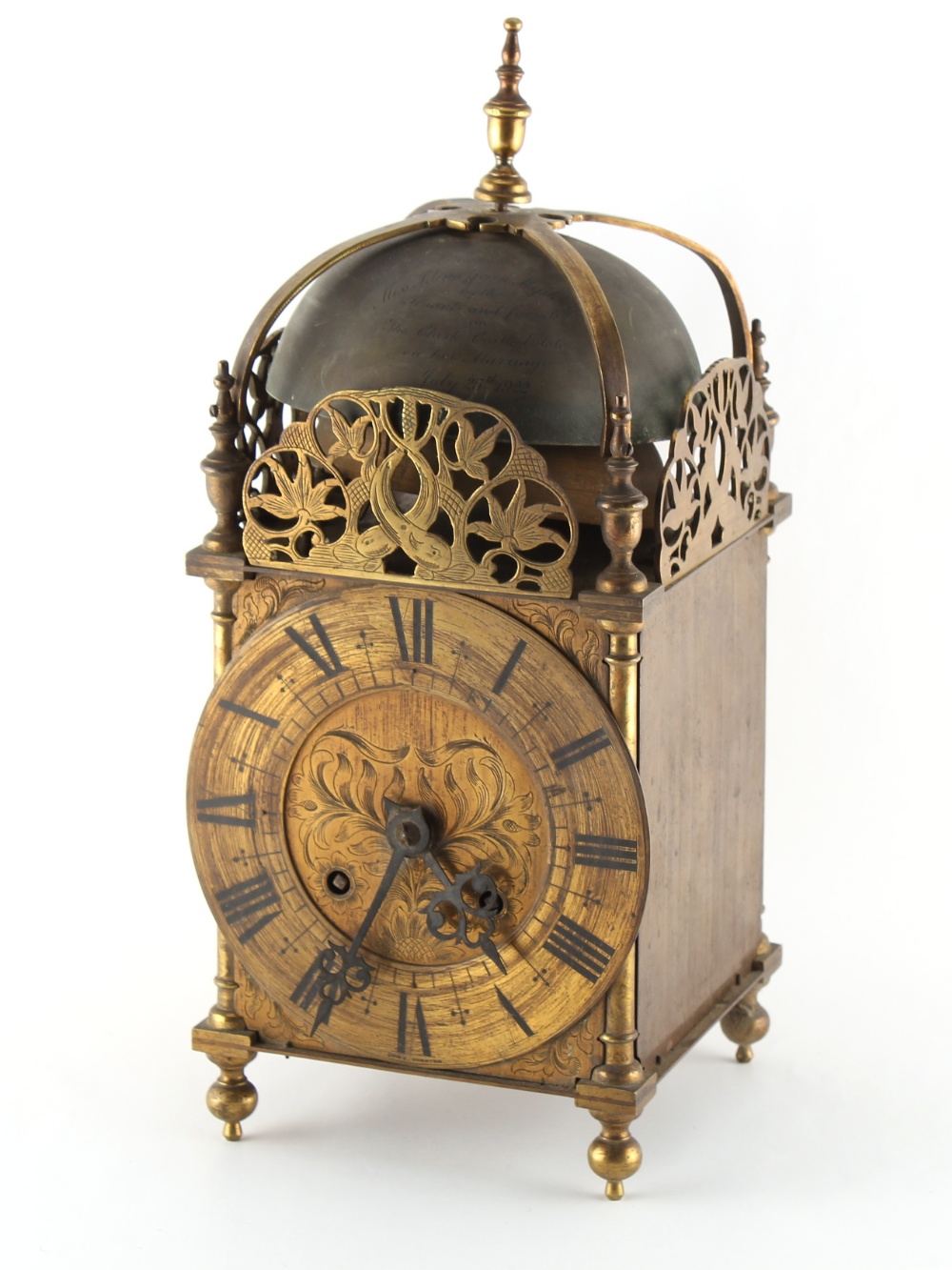 Property of a lady of title - a large early 20th century J.J. Elliott brass lantern clock, the two