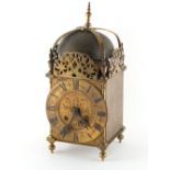 Property of a lady of title - a large early 20th century J.J. Elliott brass lantern clock, the two