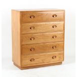 Property of a deceased estate - an Ercol light elm chest of five drawers, 36ins. (91cms.) wide.