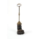 Property of a deceased estate - a 19th century black painted cast iron & brass lion's paw door stop,