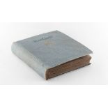 Property of a gentleman - a picture postcard album containing various postcards including naval