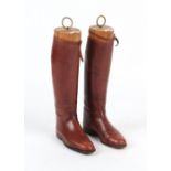 Property of a gentleman - a pair of brown leather riding boots, approximate size 8, the wooden trees