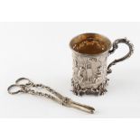 Property of a lady of title - a good quality Victorian silver mug, with repousse decoration to one