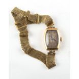 Property of a lady - an early 20th century lady's 18ct gold cased wristwatch on 18ct gold mesh