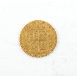 Property of a deceased estate - a 1776 George III gold half guinea coin.
