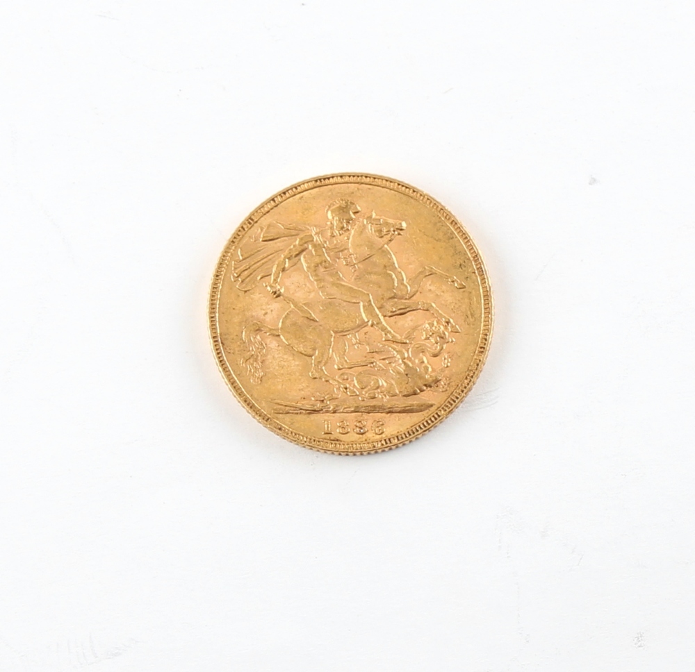 Property of a lady - gold coin - an 1886 Queen Victoria gold full sovereign.