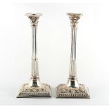 Property of a lady - a pair of George III silver Corinthian column candlesticks, William Cafe, Londo