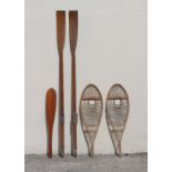 Property of a lady - a pair of 7' long wooden oars, metal tipped; together with a wooden paddle; and