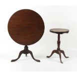 Property of a gentleman - a George III circular tilt-top tripod table, 30ins. (76cms.) diameter;