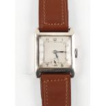The Henry & Tricia Byrom Collection - a silver square cased wristwatch with Swiss 15-jewel movement,