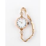 The Henry & Tricia Byrom Collection - a lady's early 20th century 9ct gold cased wristwatch on 9ct