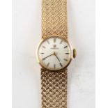 Property of a deceased estate - a lady's Omega 9ct gold cased wristwatch on Omega 9ct gold mesh