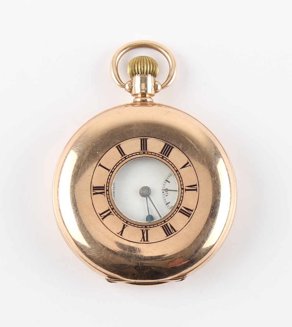 The Henry & Tricia Byrom Collection - an Omega 9ct gold half hunter cased pocket watch, with blue