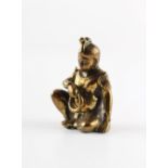 A small Tibetan bronze figure of Buddha, 18 / 19th century, 2.1ins. (5.3cms.) high.