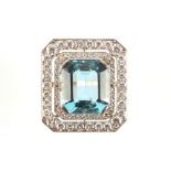 A good aquamarine & diamond ring, the large octagonal cut aquamarine of excellent colour and