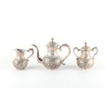 The Henry & Tricia Byrom Collection - an early 20th century Chinese silver three piece tea set,