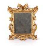 Property of a gentleman - an early 20th century Florentine carved giltwood framed wall mirror, 22.