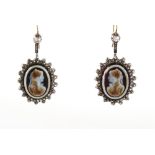 A good pair of 19th century hardstone cameo & diamond earrings, circa 1860, each oval cameo carved