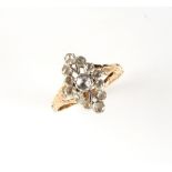 A 19th century 14ct gold diamond cluster ring, with rose cut diamonds in a pierced navette shaped