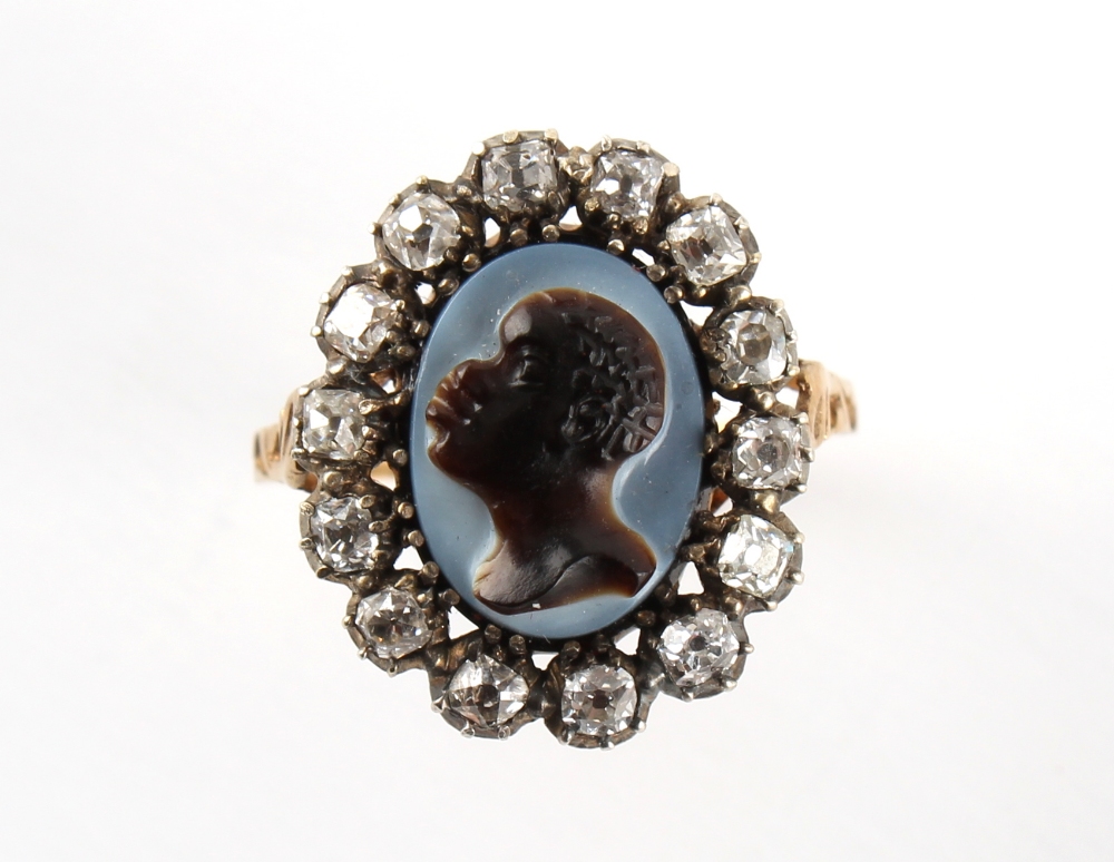 A 19th century unmarked yellow gold diamond & hardstone oval cameo ring, carved with a blackamoor or - Image 3 of 4