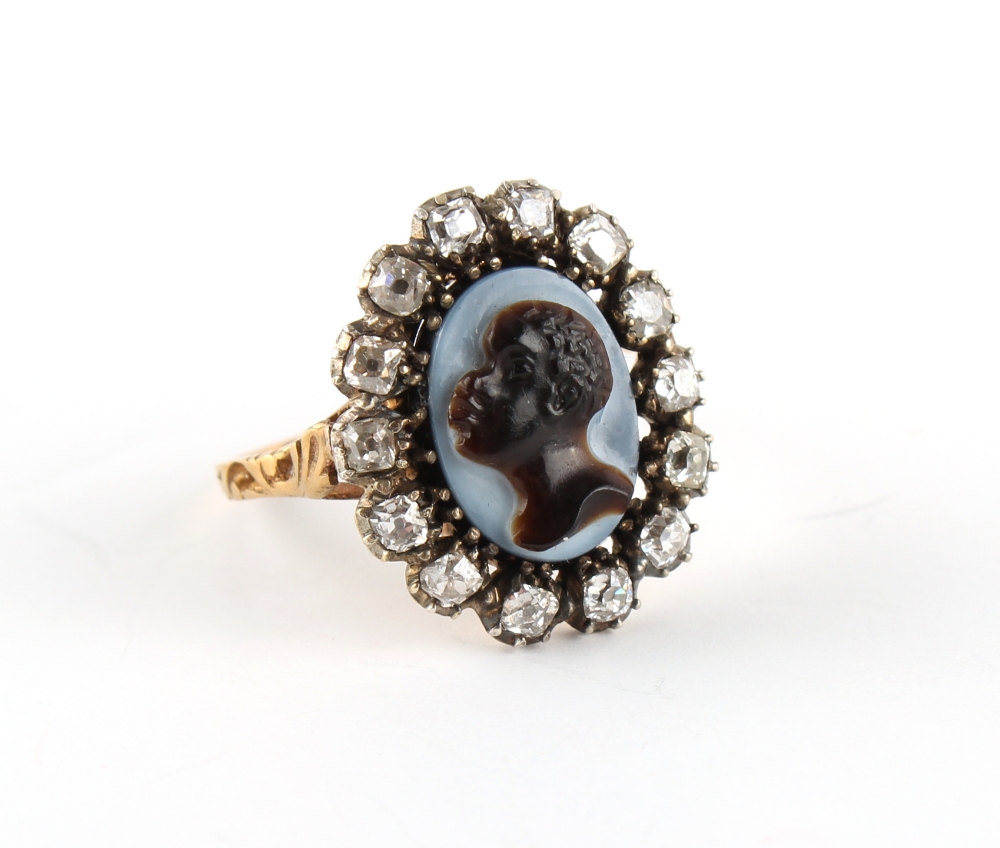 A 19th century unmarked yellow gold diamond & hardstone oval cameo ring, carved with a blackamoor or - Image 2 of 4