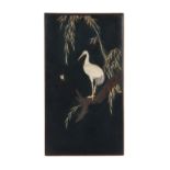 A Japanese mother-of-pearl & ivory inlaid black lacquer rectangular panel depicting a crane &