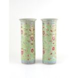 Property of a gentleman - a pair of Chinese famille rose lime green ground sleeve vases, Guangxu