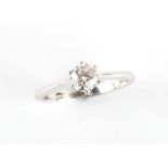 An 18ct white gold & platinum diamond single stone ring, the claw set round brilliant cut diamond