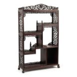 A Chinese carved hongmu display cabinet, of small size, late 19th / early 20th century, 51.75ins. (