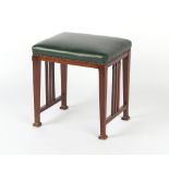 Property of a lady - an Edwardian Art Nouveau mahogany dressing stool or piano stool.