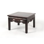 A Chinese hongmu square topped kang table, late 19th / early 20th century, with carved frieze,